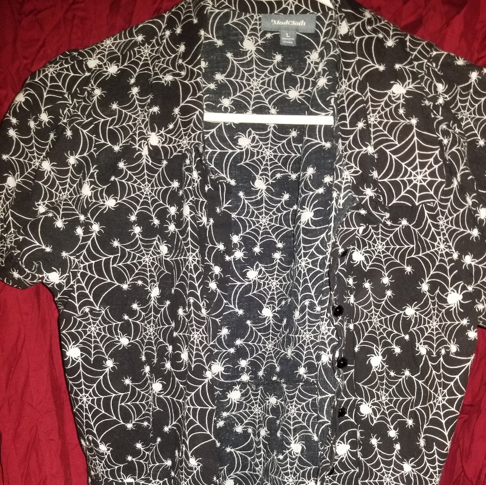 Modcloth peplum spider shirt.